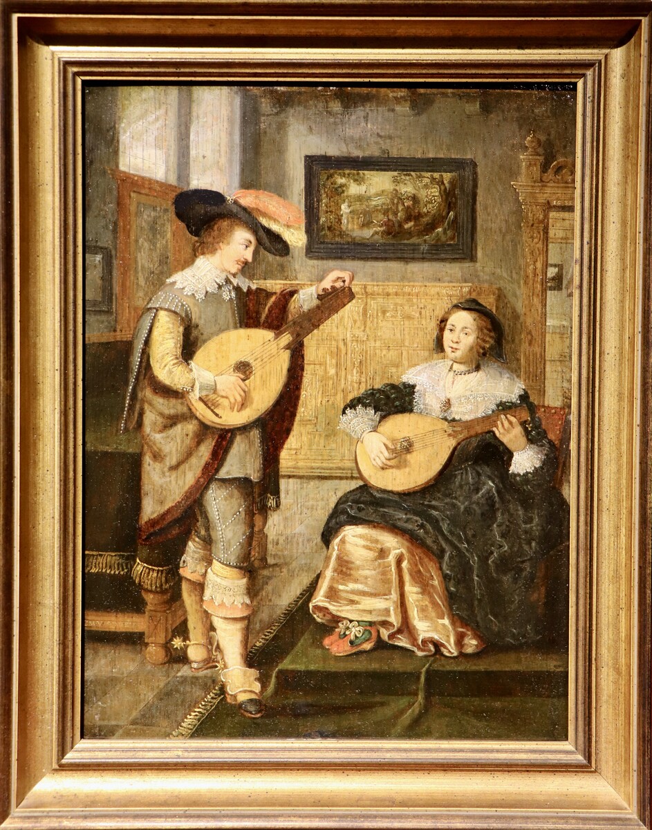 A couple playing the lute