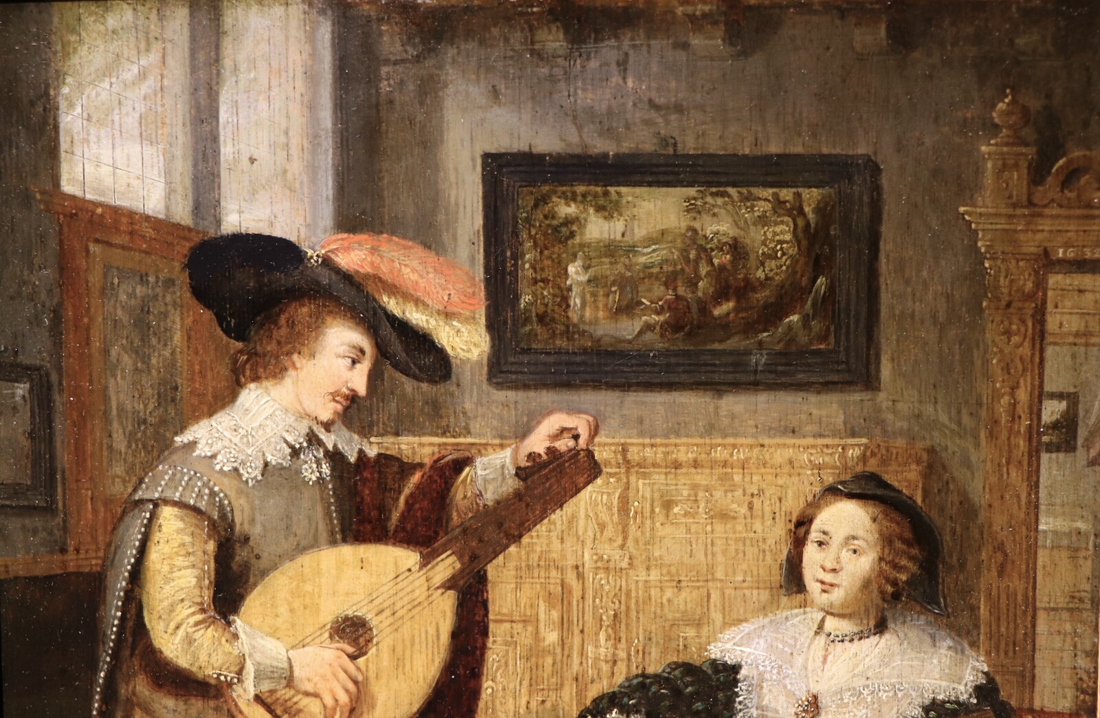 A couple playing the lute