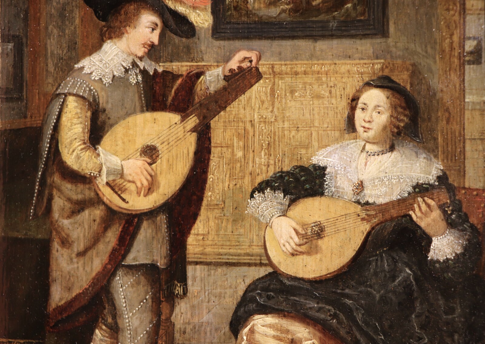 A couple playing the lute