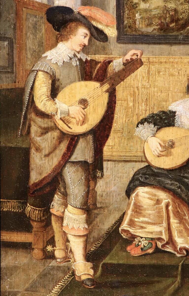 A couple playing the lute