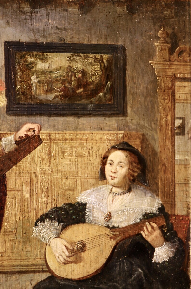 A couple playing the lute