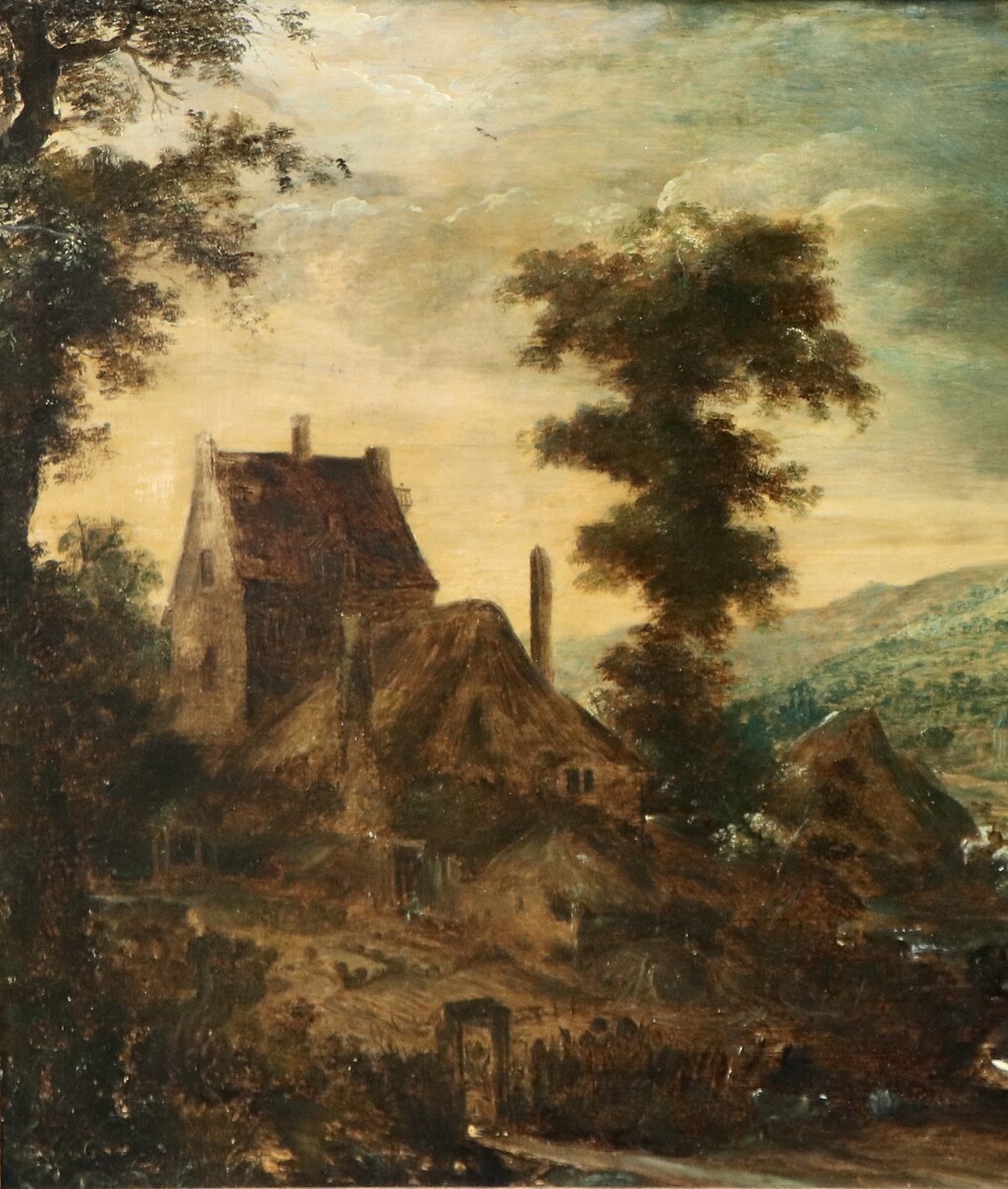 A hilly landscape with a farmhouse at left