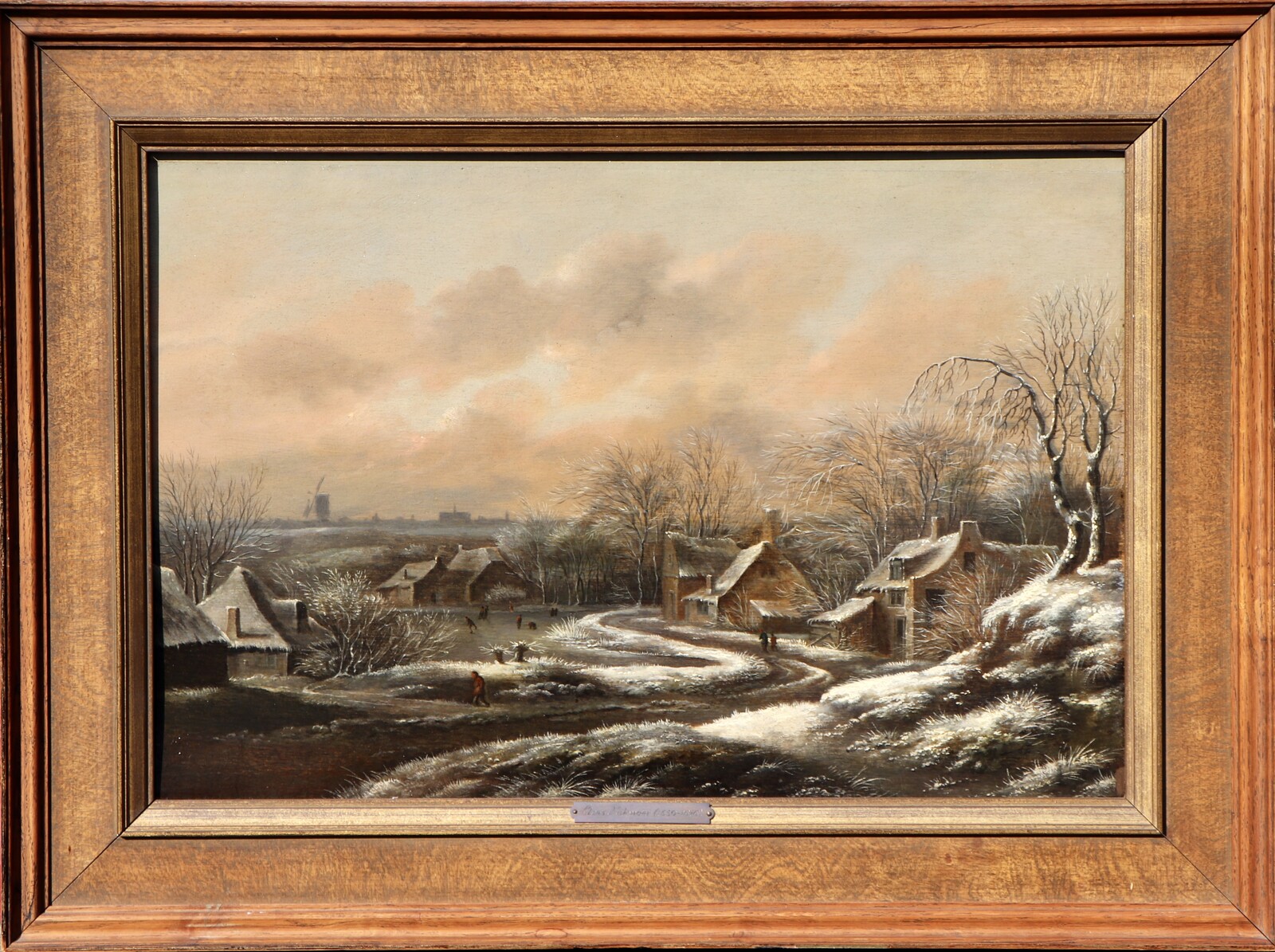 A winter landscape with a view of Haarlem in the back