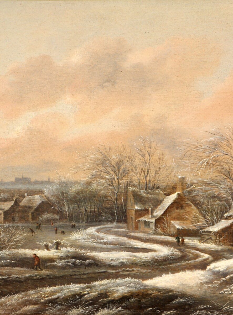 A winter landscape with a view of Haarlem in the back