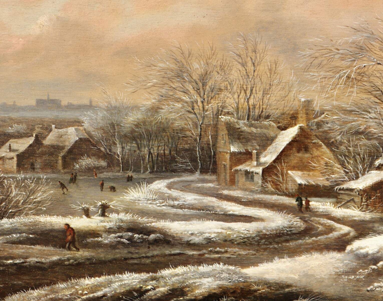 A winter landscape with a view of Haarlem in the back