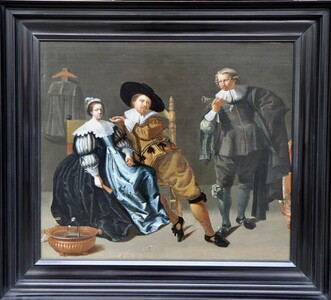 Interior scene with two men and a woman