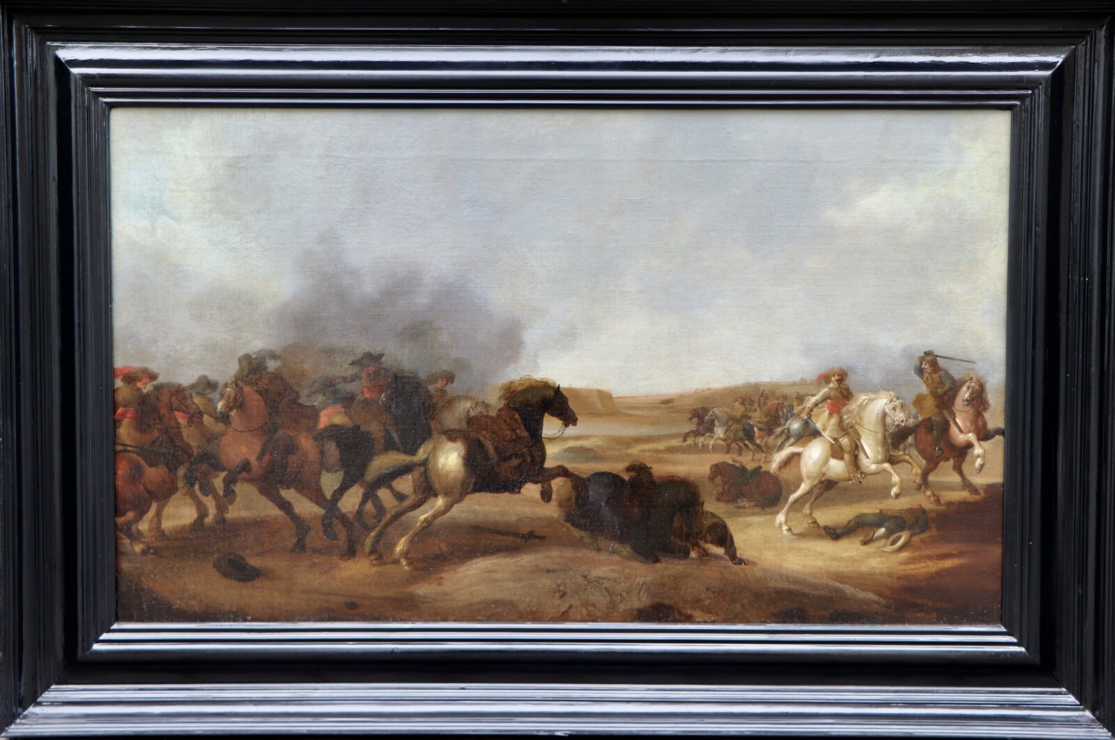 One of a pair of cavalry battle scenes