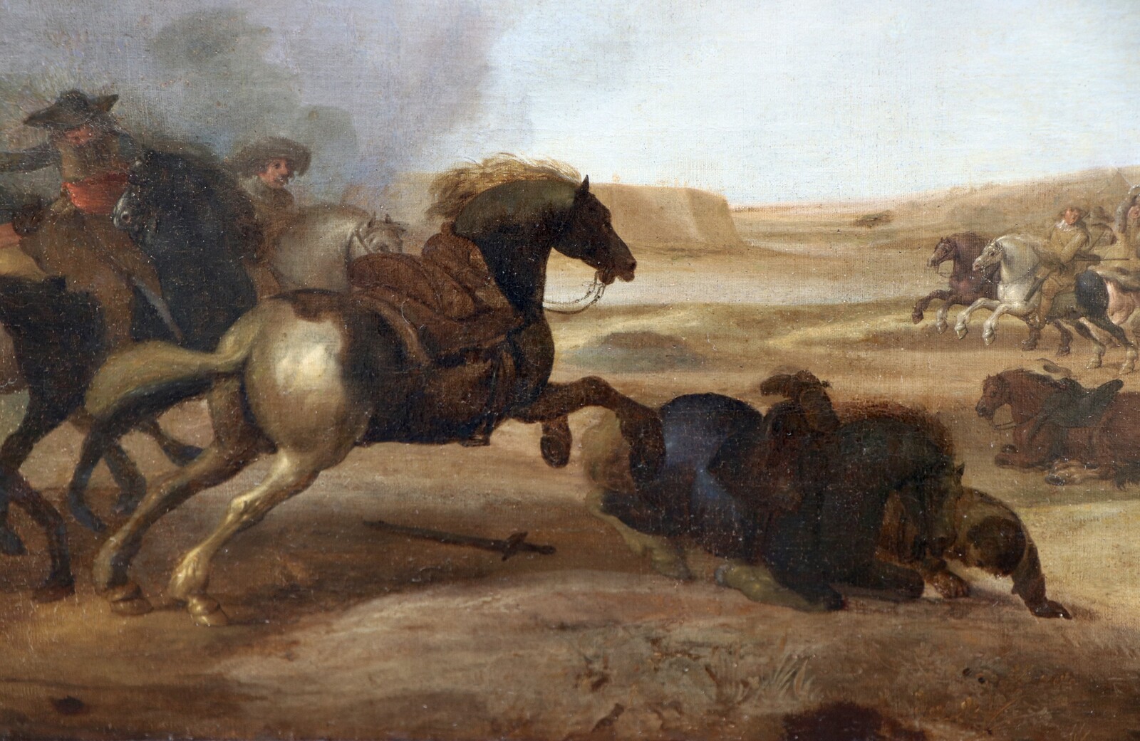 One of a pair of cavalry battle scenes