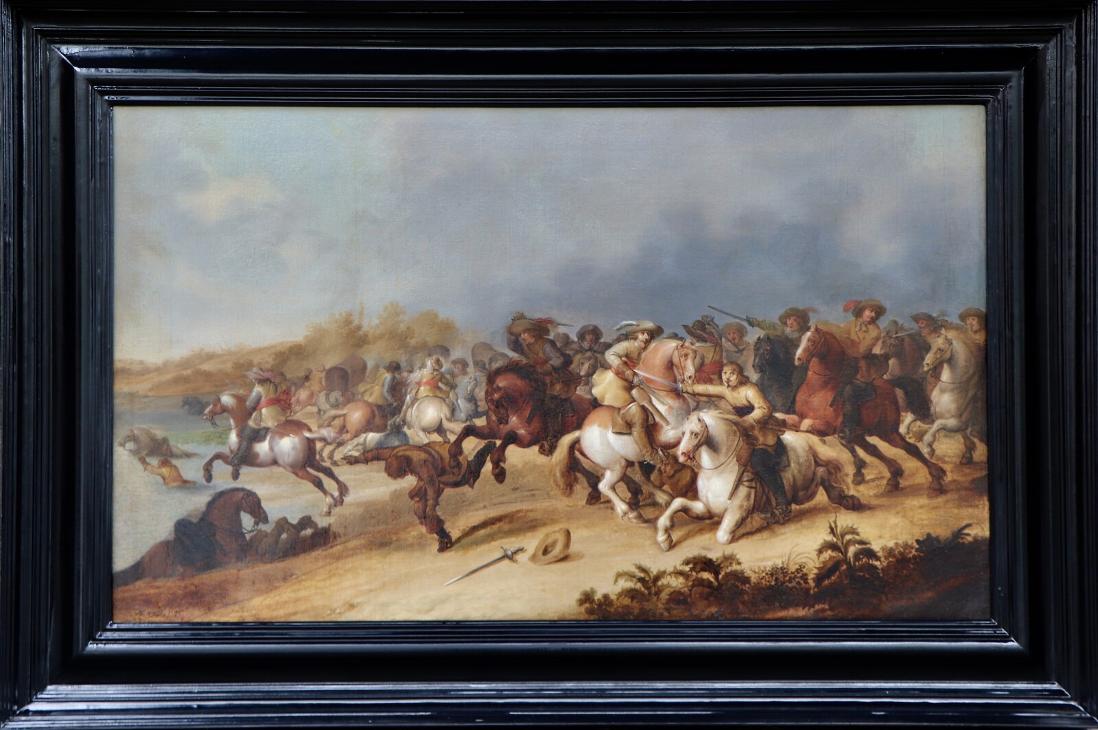 One of a pair of cavalry battle scenes