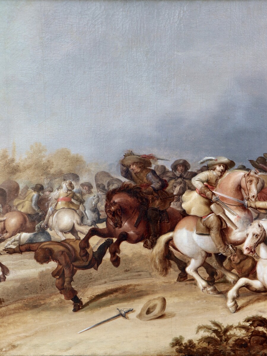 One of a pair of cavalry battle scenes