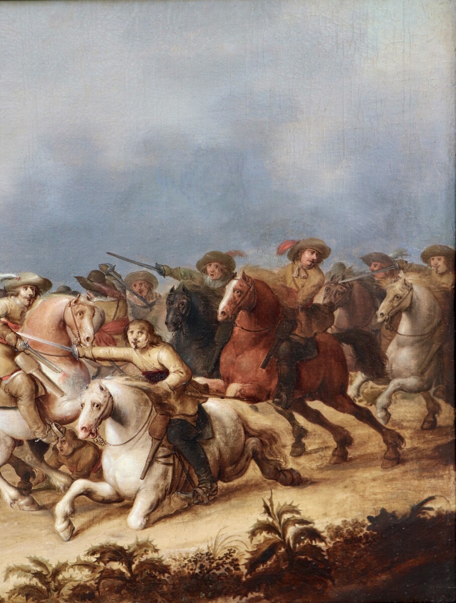 One of a pair of cavalry battle scenes