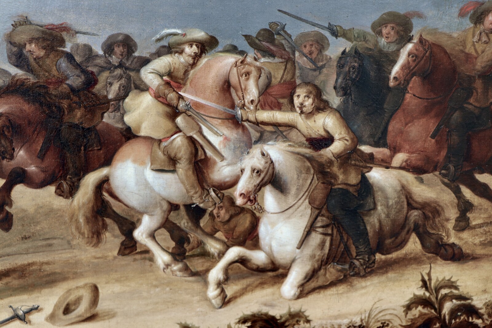 One of a pair of cavalry battle scenes