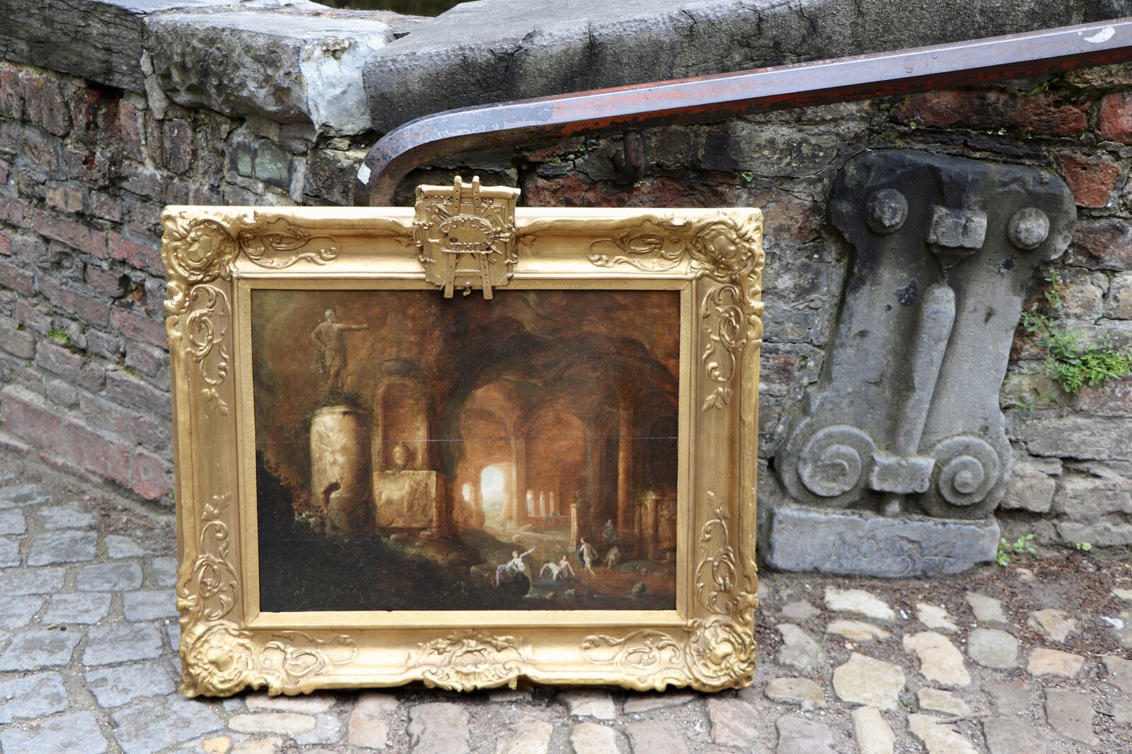 Women bathing in a cavern with Roman monuments